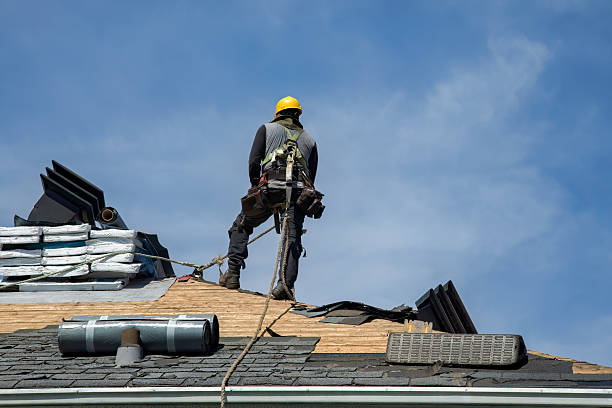 Professional Roof Replacement technician working in Ashland, NH